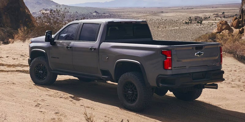 Chevrolet Silverado 2500 HD running in an off-road desert scene.